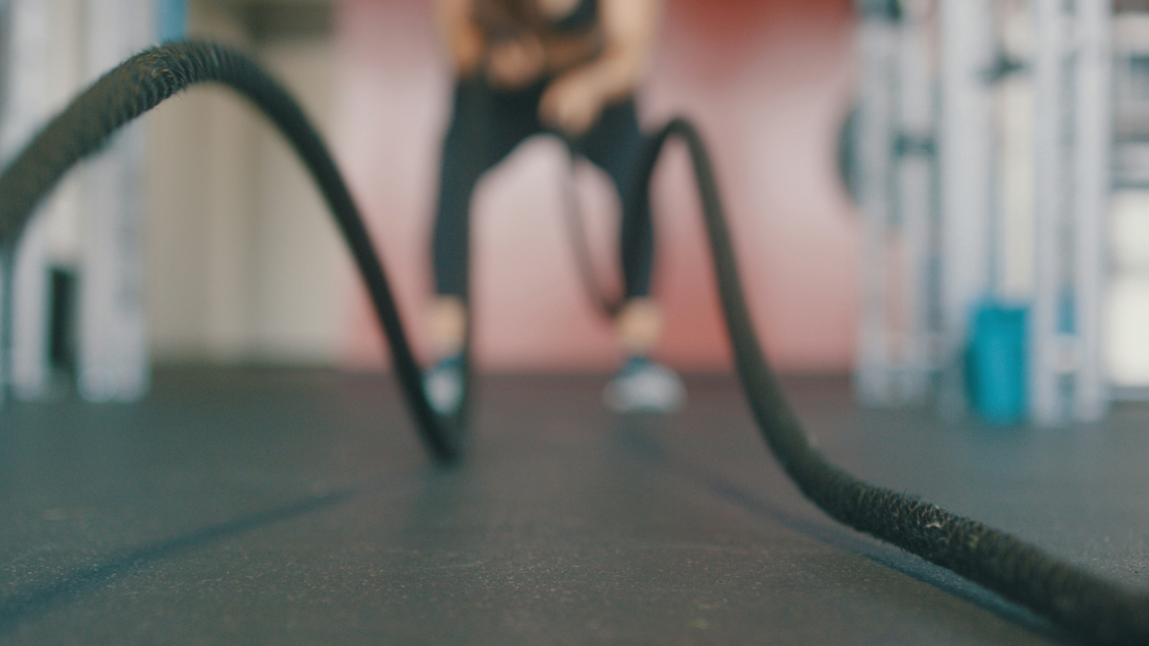 Two people performing a partner HIIT exercise together
